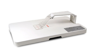 Guía centrado del tejido en el bastidor