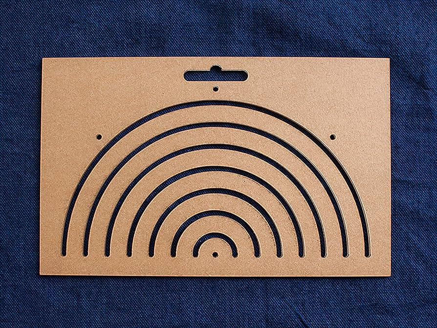 Regla para marcar  semi-círculos sobre  cualquier superficie.