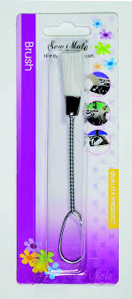 Cepillo para limpieza de máquinas de coser.